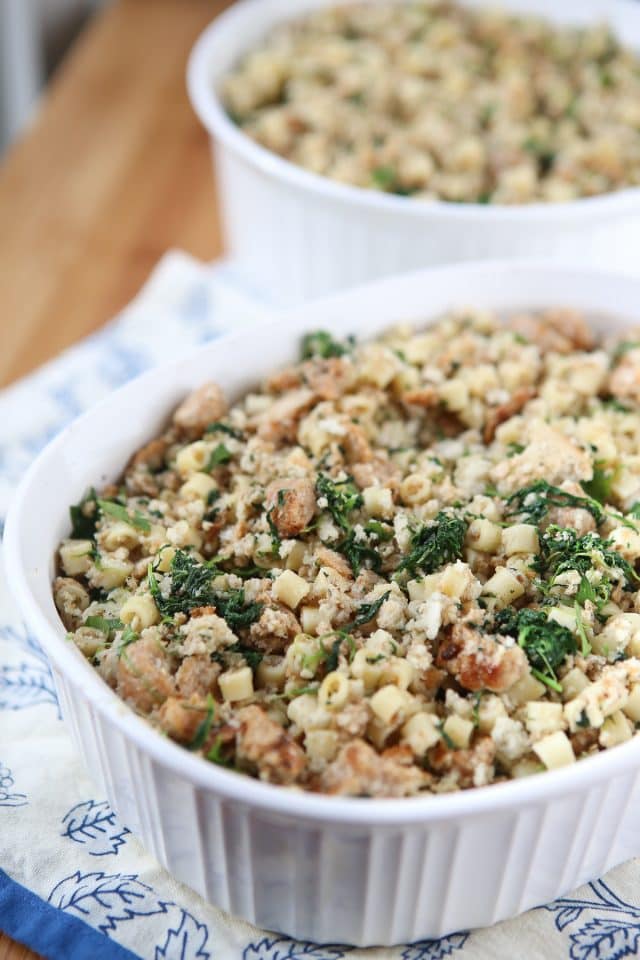 close up of corning ware baking dish with Italian style stuffing made with pasta and sausage