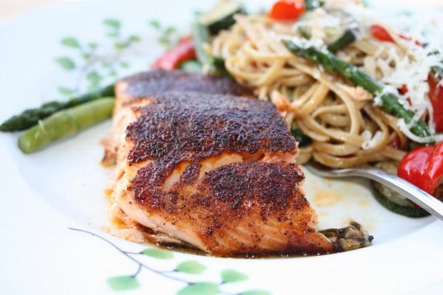 Broiled Salmon with Sweet Spicy Rub is the perfect recipe to introduce salmon to your family! Full of flavor, packed with protein & easy to make! An Ellie Krieger recipe via aggieskitchen.com