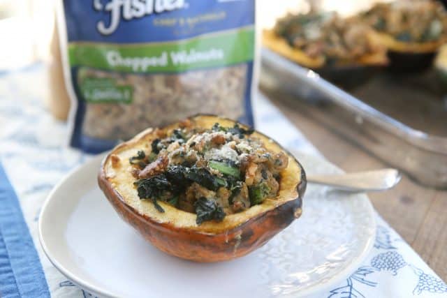 This Stuffed Acorn Squash recipe is filled with hearty ingredients like sausage, kale & walnuts. Makes a great dish for entertaining or healthy meal prep!