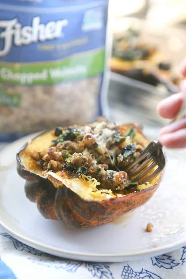 This Stuffed Acorn Squash recipe is filled with hearty ingredients like sausage, kale & walnuts. Makes a great dish for entertaining or healthy meal prep!