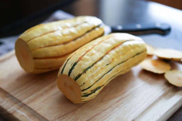 Angela's Stuffed Roasted Delicata Squash is flavorful and healthy vegetarian dish that can be served as a meal, or side dish.