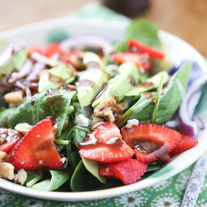 This Spinach Strawberry and Walnut Salad with Raspberry Balsamic Vinaigrette is classic - and full of nutrition! One of my favorite salads ever.