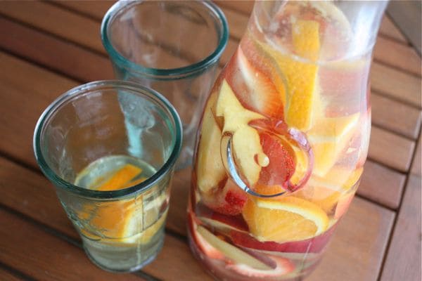Start your weekend off with this simple Fruity White Sangria beverage. Perfect for sharing on a hot summer afternoon.