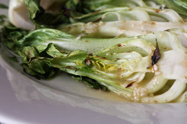 close up of plate of grilled bok choy