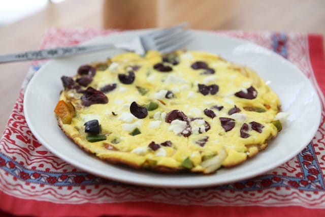 Breakfast, lunch or dinner for one! I love making frittatas for a quick meal, this Greek Pepper and Onion Frittata is one I make often! Recipe via aggieskitchen.com