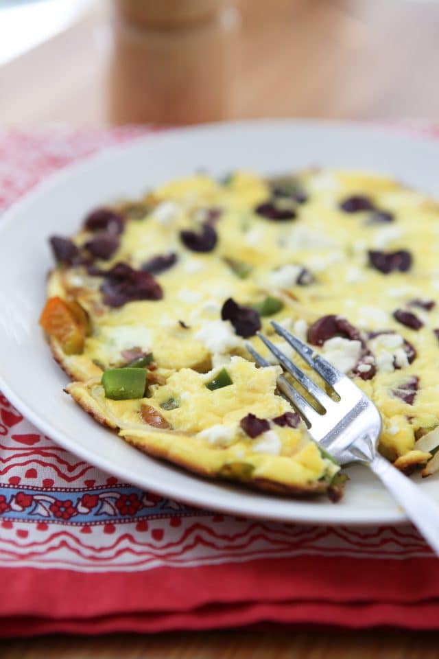 Breakfast, lunch or dinner for one! I love making frittatas for a quick meal, this Greek Pepper and Onion Frittata is one I make often! Recipe via aggieskitchen.com