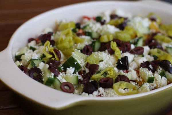 https://aggieskitchen.com/wp-content/uploads/2012/07/Greek-Salad-Layered-Dip-recipe-1.jpg