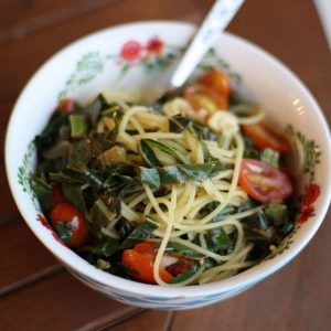 Quinoa Spaghetti with Garlicky Greens and Tomatoes