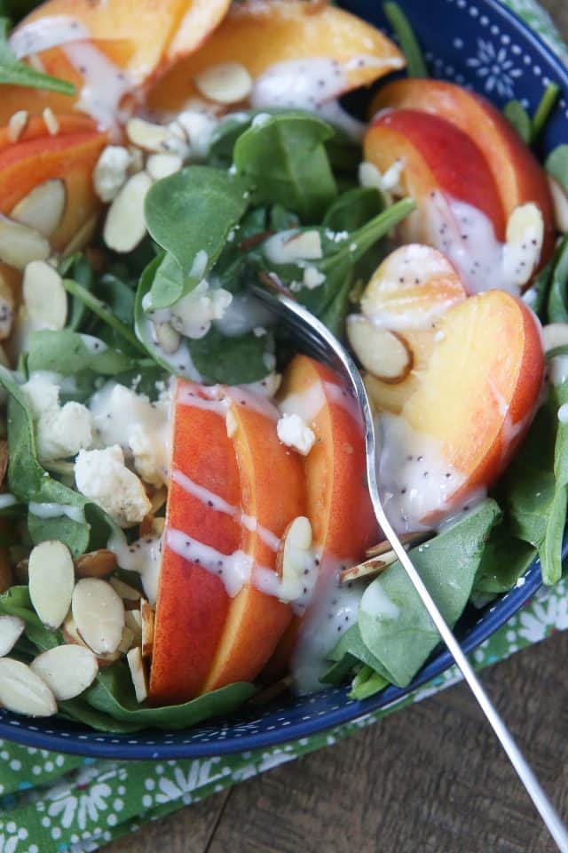 Your taste buds will be singing with this Spinach Salad with Peaches, Gorgonzola and Almonds. One of my favorite summer salads!