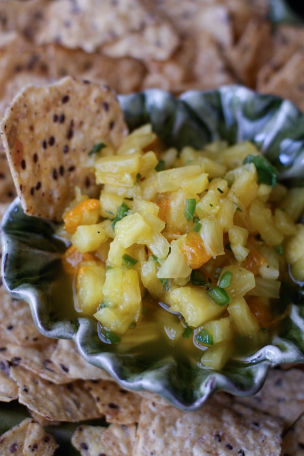 The BEST Pineapple Salsa!! Fresh and fruity with just a little kick. Pair it with your favorite tortilla chips or serve over grilled chicken or fish. Delicious!