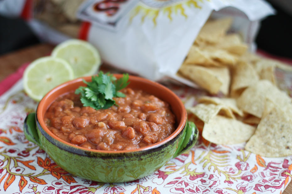Homemade flavorful version of refried beans using a few shortcuts. This Drunken Refried Bean recipe is great for a side dish or to serve as a dip. Grab some tortilla chips and dig in!