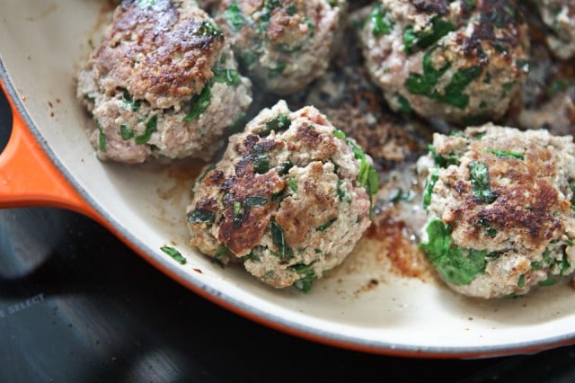 Baked Spinach and Ricotta Meatballs are easy to make and will be a family favorite! Perfect addition to Sunday Supper! Recipe via aggieskitchen.com