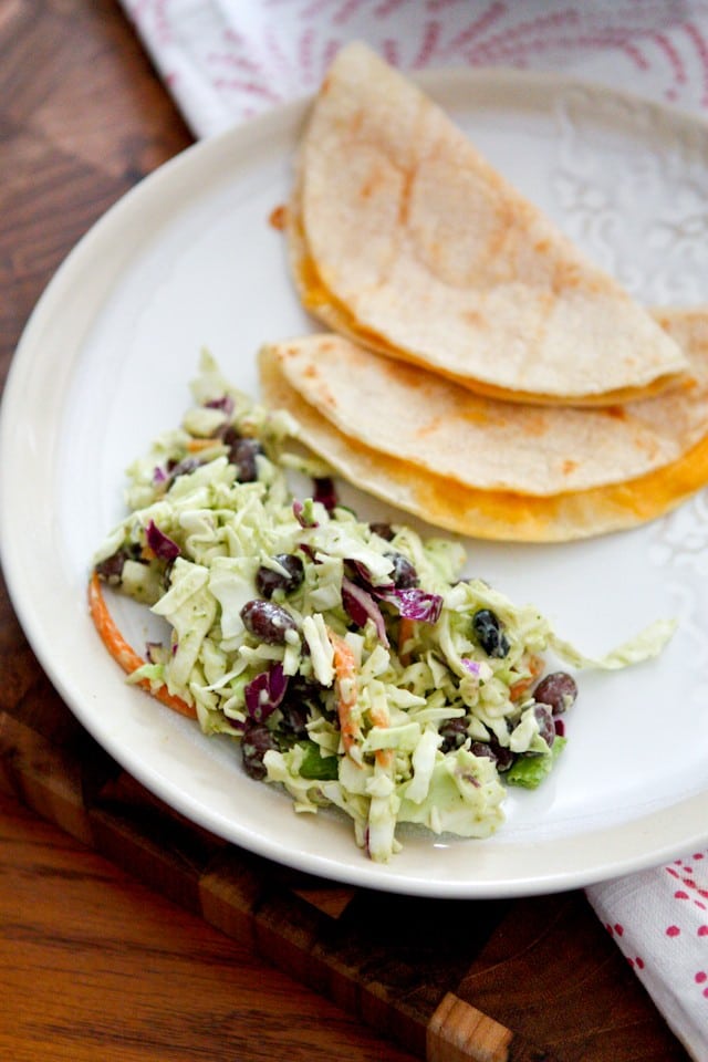 This Mexican Slaw Salad with Black Beans is a nice change up from traditional cole slaw. Serve it in tacos, or as a side dish to quesadillas or grilled chicken.