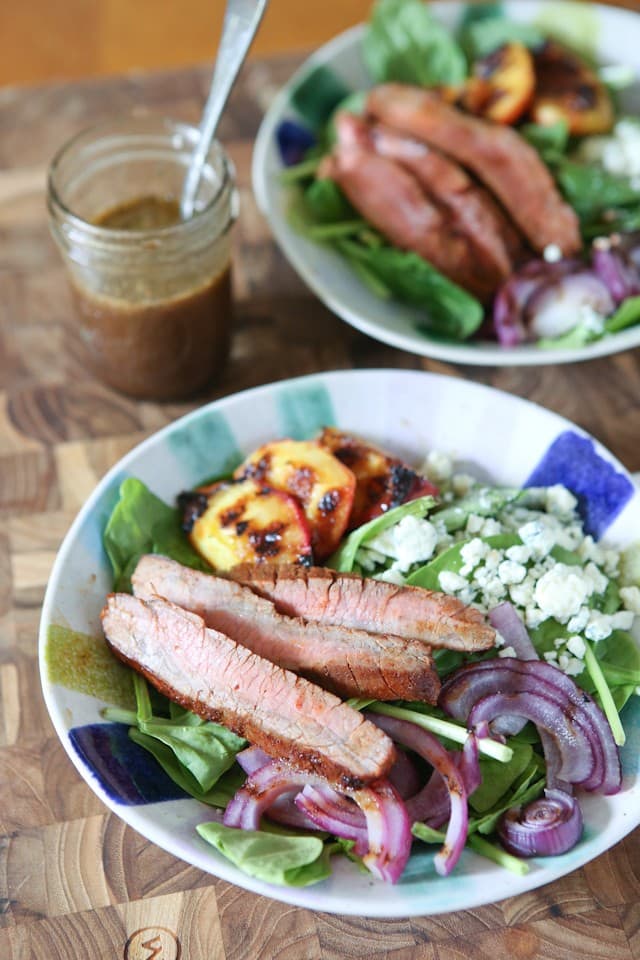 Steak Spinach Salad with Grilled Peaches and Red Onion