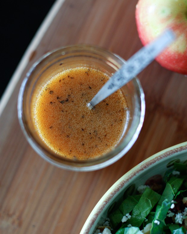 overhead shot of maple vinaigrette in a jar with spoon