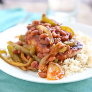 Smothered Grilled Pork Chops - Bush's Grillin' Beans help pull together this flavor yet simple and hearty meal. Your family will love it!