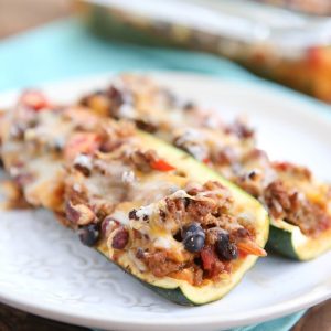 Leftover Chili Stuffed Zucchini Boats - great way to use up leftover chili, low carb and very filling. Great for anyone trying to lose weight!