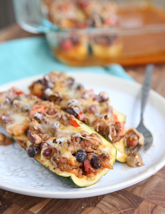 Leftover Chili Stuffed Zucchini Boats - great way to use up leftover chili, low carb and very filling. Great for anyone trying to lose weight!