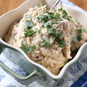 Add these light and creamy Slow Cooker Mashed Potatoes (with cauliflower & Greek yogurt) to your holiday menu. A family favorite recipe from Produce For Kids!