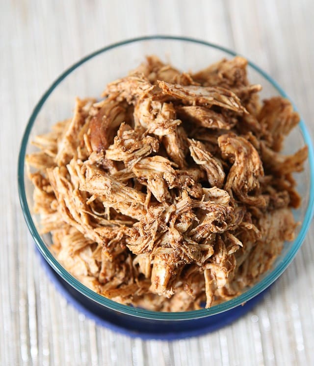 Make a weekly batch of this Slow Cooker Shredded Barbecue Chicken recipe - so many ways to use it in meals!