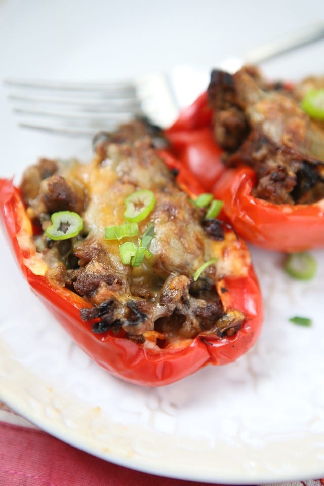 Simple and healthy, this low carb recipe for Beef and Spinach Stuffed Peppers were a hit at my house!