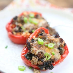 Simple and healthy, this low carb recipe for Beef and Spinach Stuffed Peppers were a hit at my house!