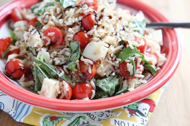 This Caprese Rice Salad recipe is bursting with fresh flavors! Great side dish for grilled meats or double the recipe to take to a barbecue or picnic.