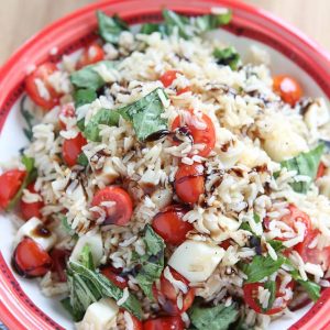 This Caprese Rice Salad recipe is bursting with fresh flavors! Great side dish for grilled meats or double the recipe to take to a barbecue or picnic.