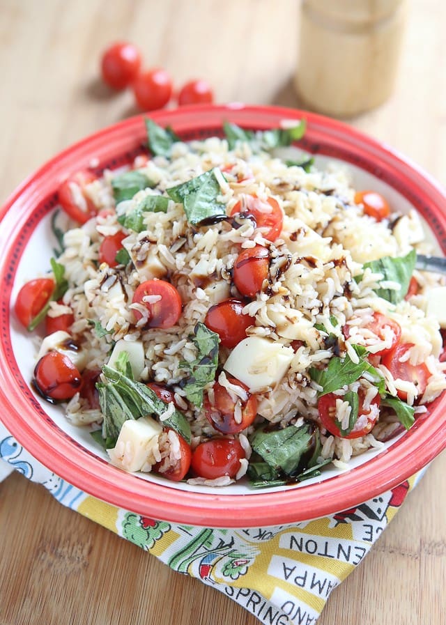 This Caprese Rice Salad recipe is bursting with fresh flavors! Great side dish for grilled meats or double the recipe to take to a barbecue or picnic.
