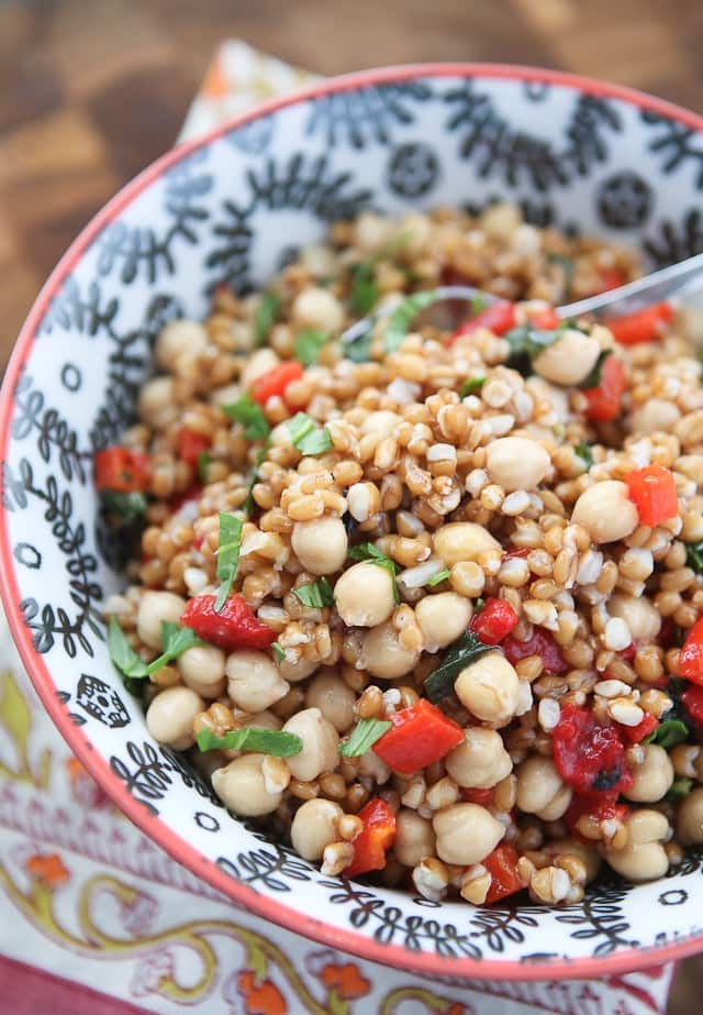 This Italian Wheat Berry Salad is simple, fresh and full of delicious flavor, protein and fiber. Perfect for picnics or barbecues!