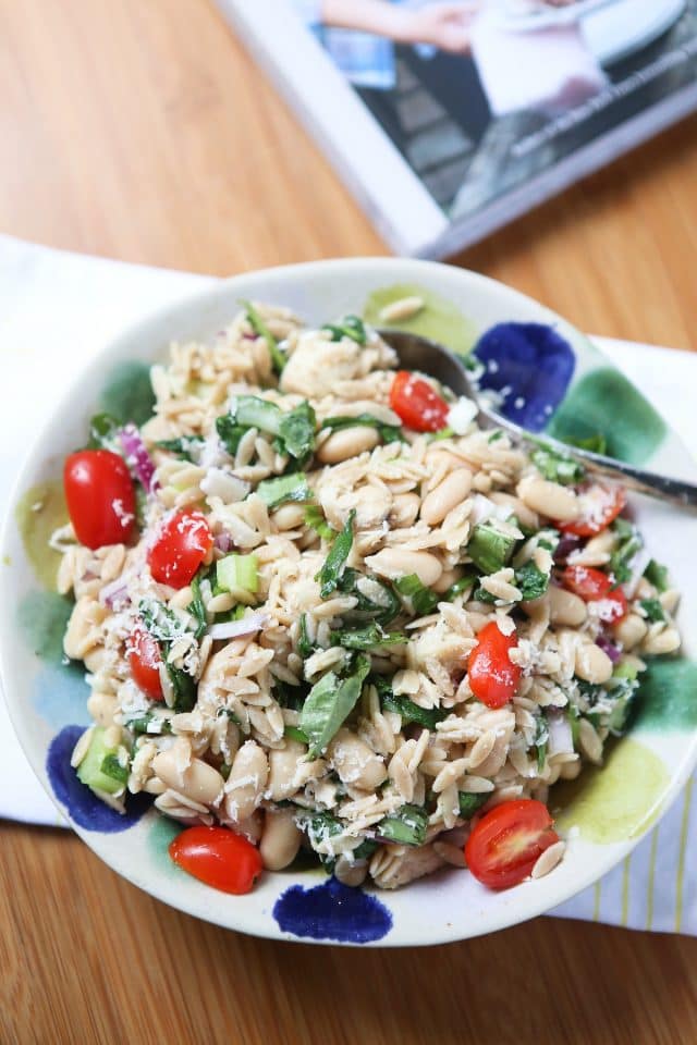 bowl with orzo, beans, cherry tomatoes, spinach, and tuna