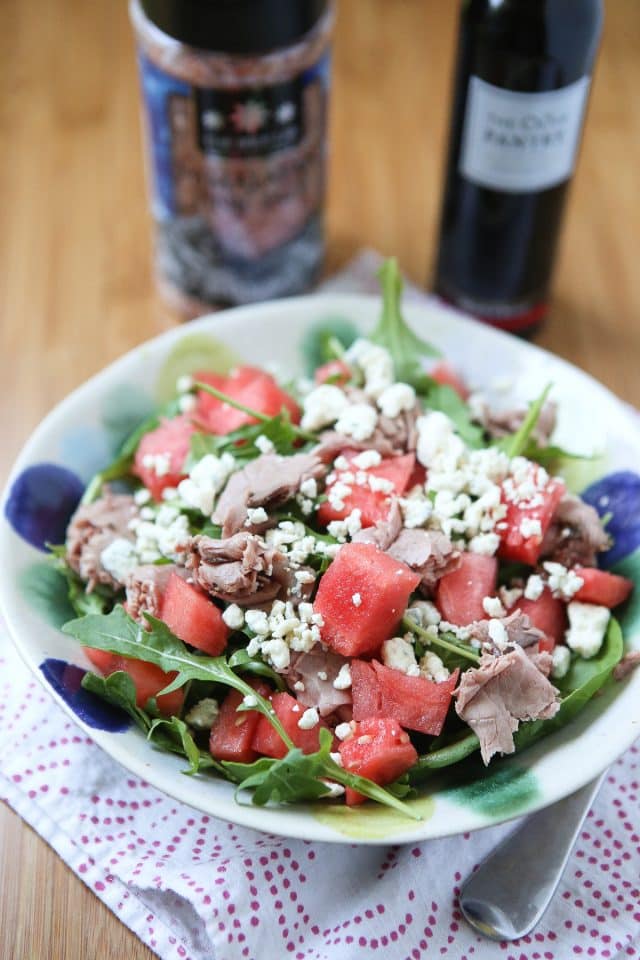 This salad screams summertime! Spinach and Arugula Salad with Watermelon, topped with sliced roast beef for protein - so easy to put together and enjoy for lunch or dinner. recipe via aggieskitchen.com