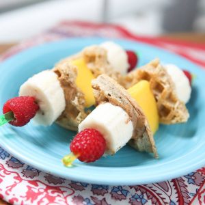 Fun breakfast idea for you and the kids! Breakfast Fruit Skewers (with whole grain waffles & nut butter) inspired by Produce for Kids.