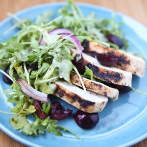 Grilled Chicken with Cherry Arugula Salad - a perfect summer meal. Light, low carb and filled with fresh flavor. Recipe via aggieskitchen.com