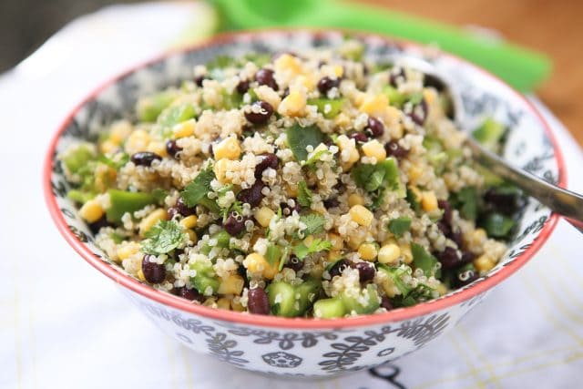 If you have been wanting (or reluctant) to try quinoa, this Corn & Black Bean Quinoa Salad recipe is for you! This Corn and Black Bean Quinoa Salad is a favorite in my house! A wonderful vegetarian meal or side dish for your main meal. Recipe via aggieskitchen.com