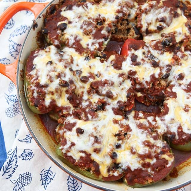 Vegetarian Enchilada Stuffed Peppers - the quinoa and black bean filling is so hearty and full of flavor, you won't miss the meat in this dish! recipe via aggieskitchen.com