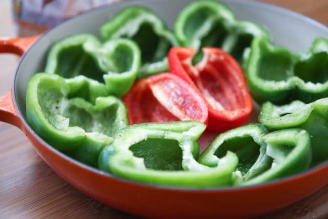 Vegetarian Enchilada Stuffed Peppers - the quinoa and black bean filling is so hearty and full of flavor, you won't miss the meat in this dish! recipe via aggieskitchen.com