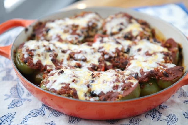 Vegetarian Enchilada Stuffed Peppers - the quinoa and black bean filling is so hearty and full of flavor, you won't miss the meat in this dish! recipe via aggieskitchen.com