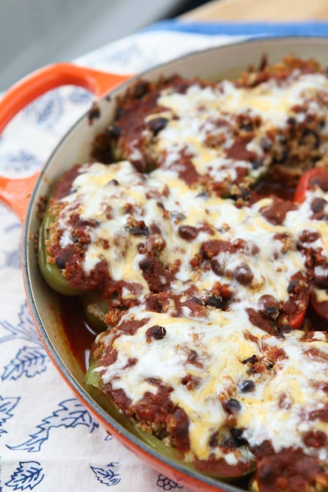Vegetarian Enchilada Stuffed Peppers - the quinoa and black bean filling is so hearty and full of flavor, you won't miss the meat in this dish! recipe via aggieskitchen.com