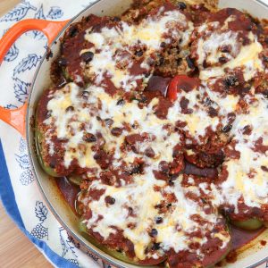 Vegetarian Enchilada Stuffed Peppers - the quinoa and black bean filling is so hearty and full of flavor, you won't miss the meat in this dish! recipe via aggieskitchen.com