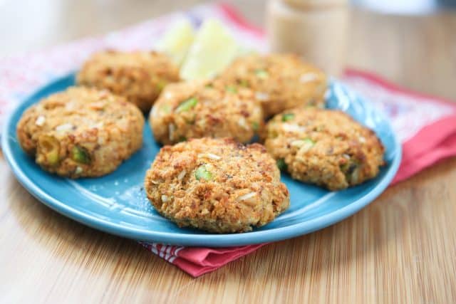 baked salmon cakes on blue plate