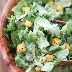 Escarole Caesar Salad with Parmesan Walnut Vinaigrette and Polenta Croutons - a delicious twist on caesar salad! Recipe via aggieskitchen.com #thinkfisher
