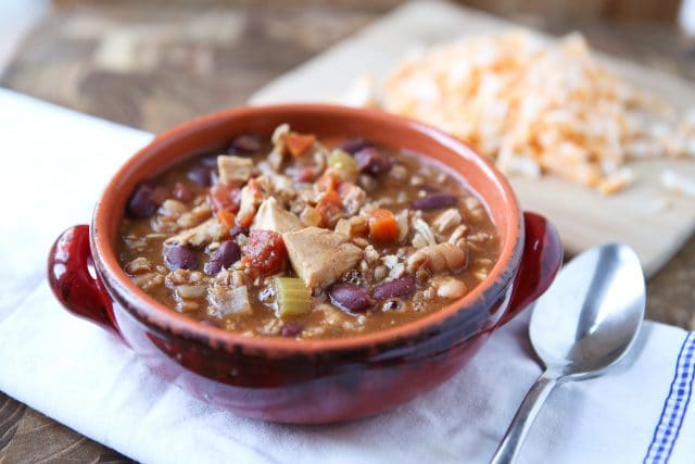Warm up this winter with Slow Cooker Chicken and Farro Chili - so hearty & healthy, filled with veggies, lean protein, whole grains and Bush's Chili Beans. Recipe via aggieskitchen.com