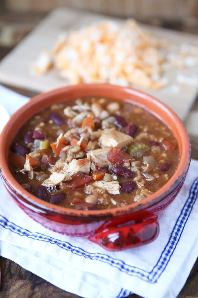 Warm up this winter with Slow Cooker Chicken and Farro Chili - so hearty & healthy, filled with veggies, lean protein, whole grains and Bush's Chili Beans. Recipe via aggieskitchen.com