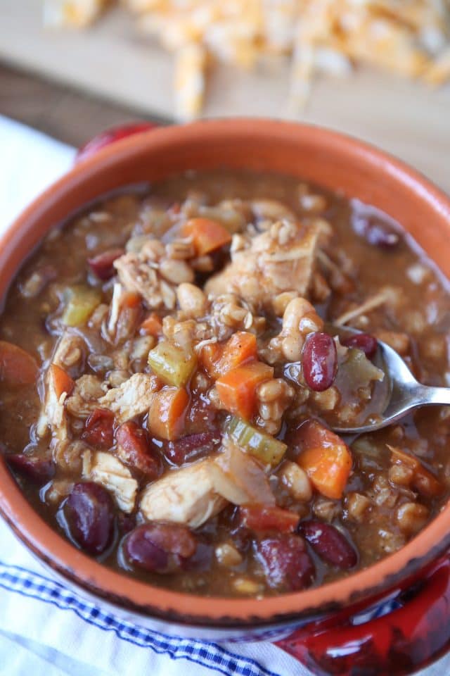 Warm up this winter with Slow Cooker Chicken and Farro Chili - so hearty & healthy, filled with veggies, lean protein, whole grains and Bush's Chili Beans. Recipe via aggieskitchen.com