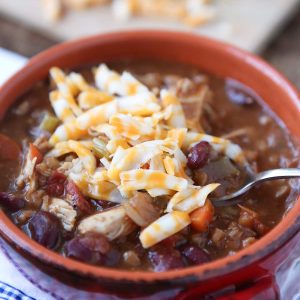 Warm up this winter with Slow Cooker Chicken and Farro Chili - so hearty & healthy, filled with veggies, lean protein, whole grains and Bush's Chili Beans. Recipe via aggieskitchen.com