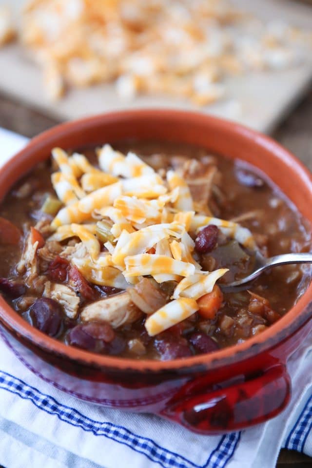 Warm up this winter with Slow Cooker Chicken and Farro Chili - so hearty & healthy, filled with veggies, lean protein, whole grains and Bush's Chili Beans. Recipe via aggieskitchen.com