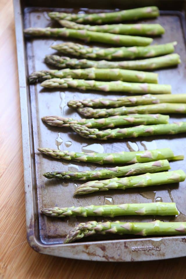 Roasted Asparagus is an easy way to get this spring vegetable favorite on the table at dinner time. Seasoned simply with just olive oil, salt and pepper and roasted to perfection.