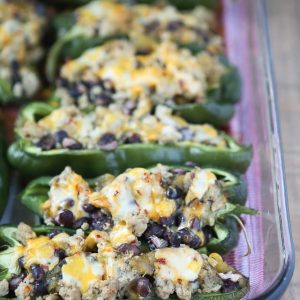 Only 5 ingredients to make these delicious Stuffed Poblano Peppers with Turkey and Black Beans! A light, healthy dinner perfect for weeknights. Leftovers make for great lunches too! Recipe via aggieskitchen.com