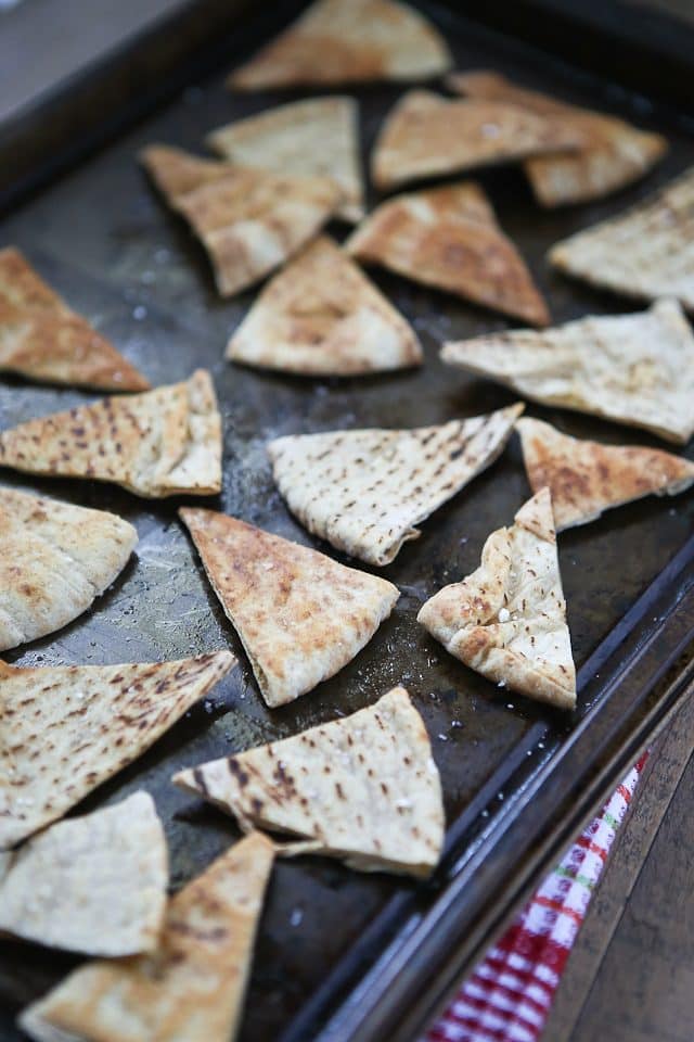 sheet pan with crispy baked pita chip triangles